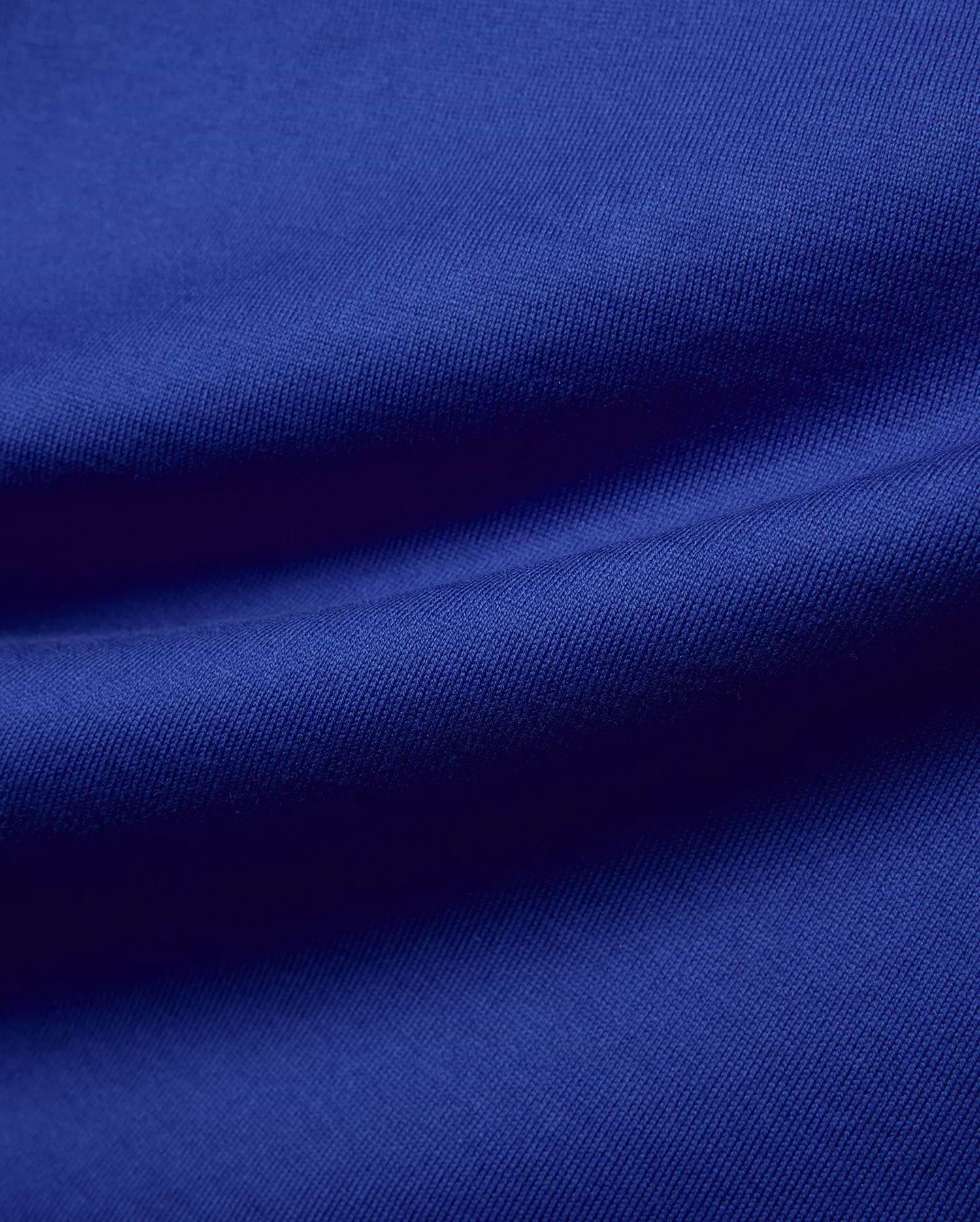 Mens Nathaniel Relaxed Fit Tee in vibrant royal blue, showcasing a premium, soft, textured jersey knit fabric with subtle folds and rich color.
