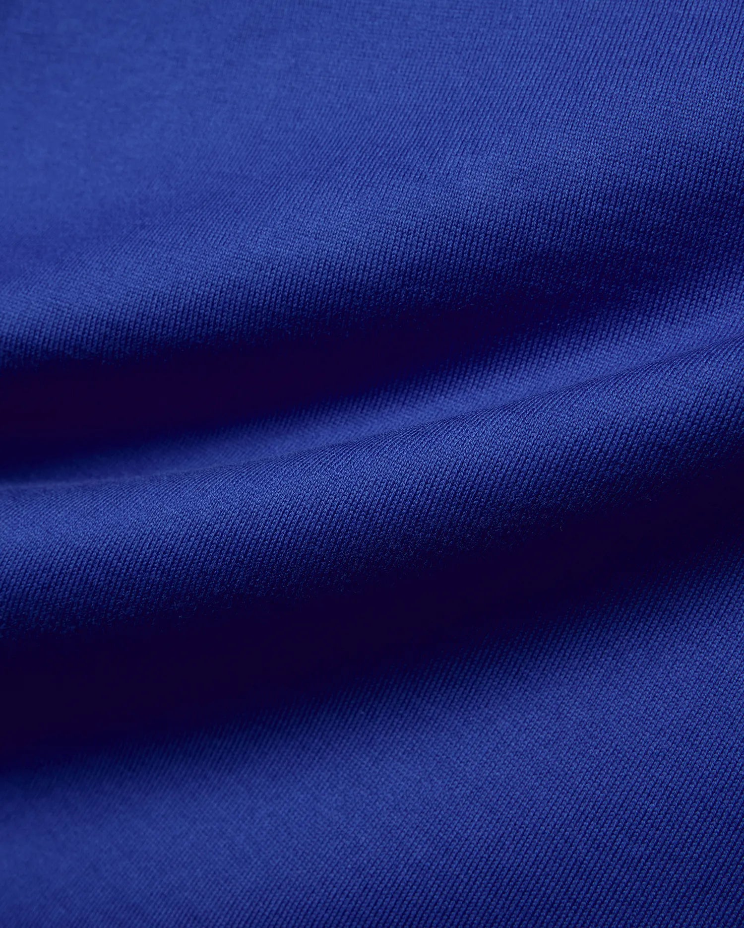 Mens Nathaniel Relaxed Fit Tee in vibrant royal blue, showcasing a premium, soft, textured jersey knit fabric with subtle folds and rich color.