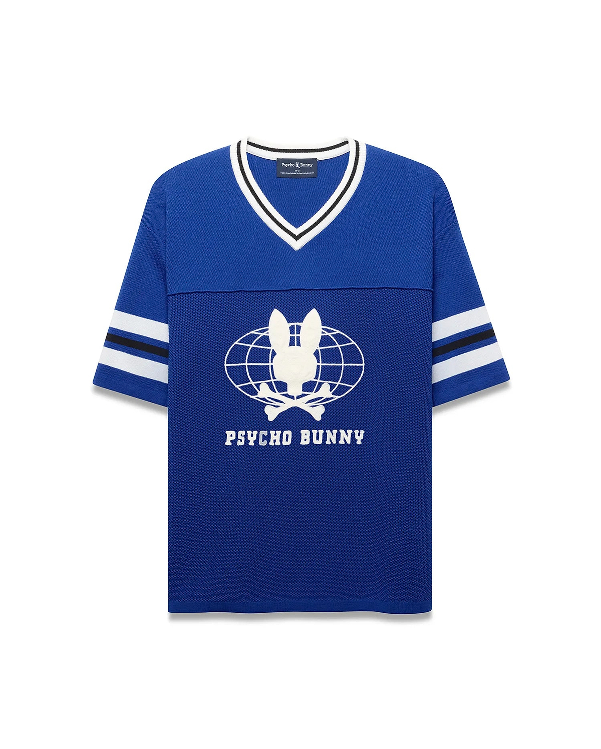 Royal blue Mens Mike Knit Graphic Jersey, relaxed fit, with white/black striped knit V-neck and sleeves. Features a large white Psycho Bunny skull globe graphic and text on the mesh-textured chest. (6)