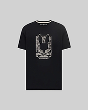 Mens Keon Embroidered Graphic Tee, a black classic fit jersey knit t-shirt featuring a large white Psycho Bunny skull logo graphic with intricate patterns on the chest and a small logo on the back neck. (1)