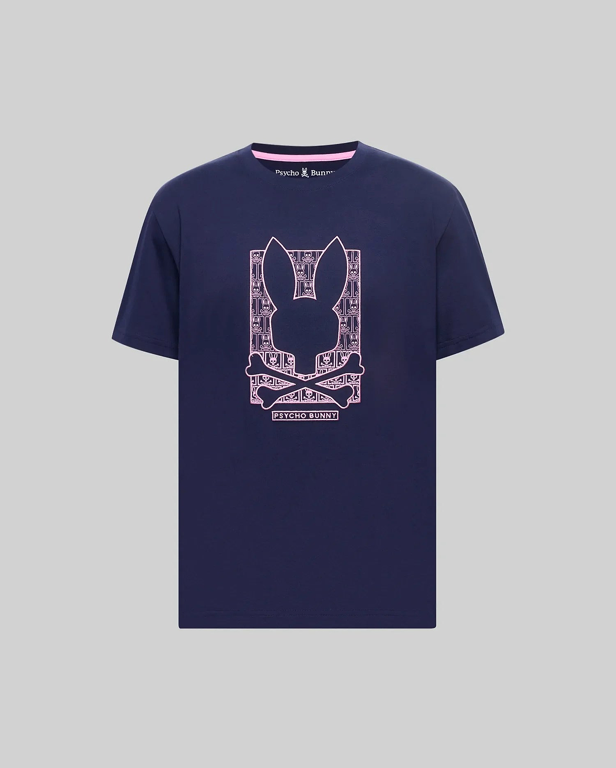 Navy classic fit jersey t-shirt with a large pink Psycho Bunny skull graphic on the chest, featuring a patterned background and pink inner neck trim. Mens Keon Embroidered Graphic Tee. (1)