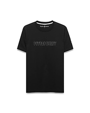 Mens Joji Wordmark Graphic Tee, a classic fit black jersey t-shirt with a white ribbed crewneck, featuring a large white outline PSYCHO BUNNY graphic on the front and a small embroidered bunny skull logo on the left chest.