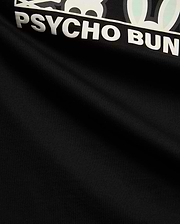 Mens Byron Graphic Tee, black jersey knit with a prominent white and mint green Psycho Bunny skull logo and bold PSYCHO BUNNY text graphic print on the chest. (6)