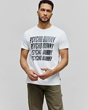 Mens Lawrence Graphic Tee, white classic fit jersey t-shirt with a large, central black and grey blurred PSYCHO BUNNY text graphic repeated down the chest. (2)