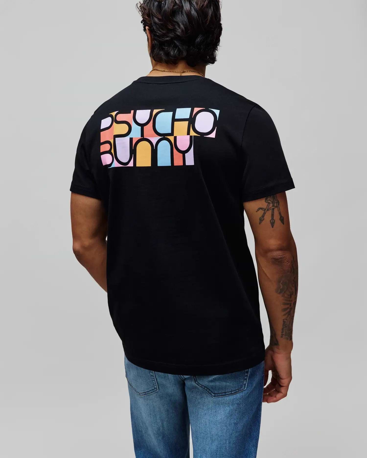 Black Mens Raphael Back Graphic Tee, classic fit, soft jersey knit, with a large, multi-colored block-lettered PSYCHO BUNNY graphic print on the upper back. (1)