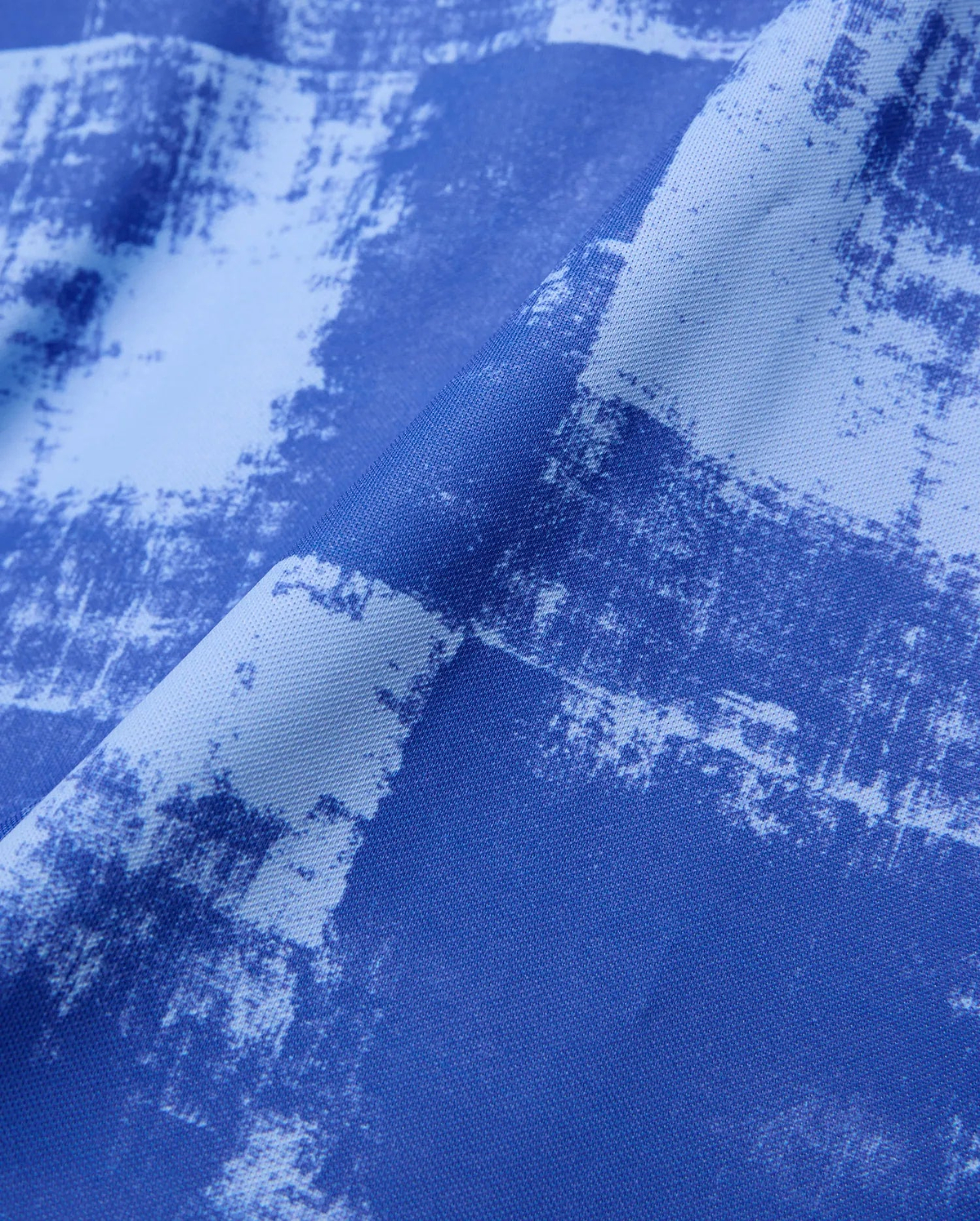 Mens Micah Oversized Soccer Jersey featuring a bold royal blue and light blue distressed abstract pattern on a textured performance fabric. (6)