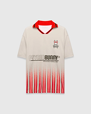 Mens Camden Oversized Soccer Jersey in beige, with a red polo collar, black stripe, small right chest Psycho Bunny skull logo, large PSYCHOBUNNY graphic, and red/black distressed vertical stripes. (5)