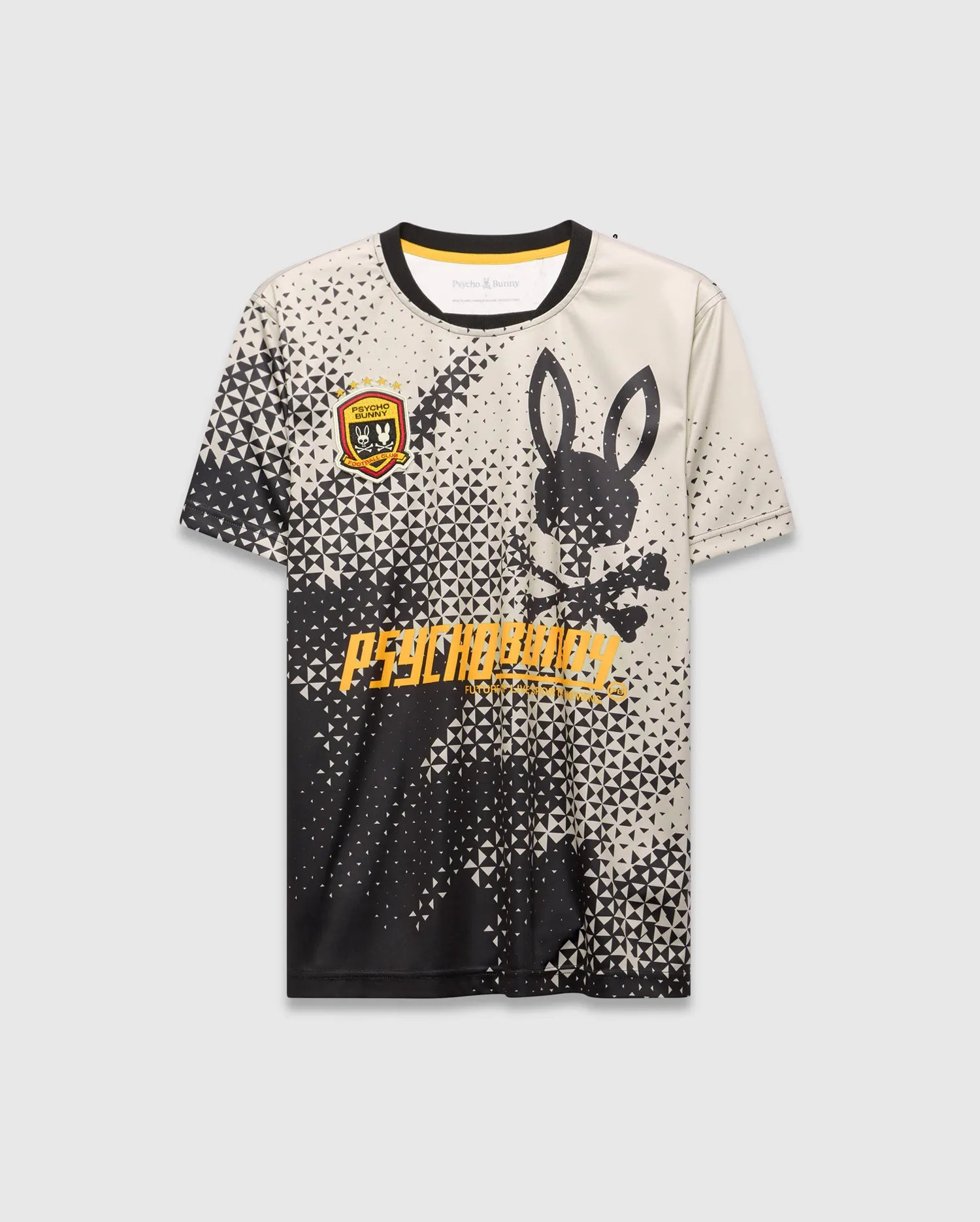 Mens Joshua Soccer Tee in black and off-white with a geometric triangle fade, featuring an embroidered red and gold Psycho Bunny Football Club crest, large bunny skull graphic, and yellow Psycho Bunny text. (5)