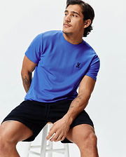 Royal blue Mens Taylor Pique Tee with a classic fit, featuring a small black embroidered Psycho Bunny skull logo on the left chest.