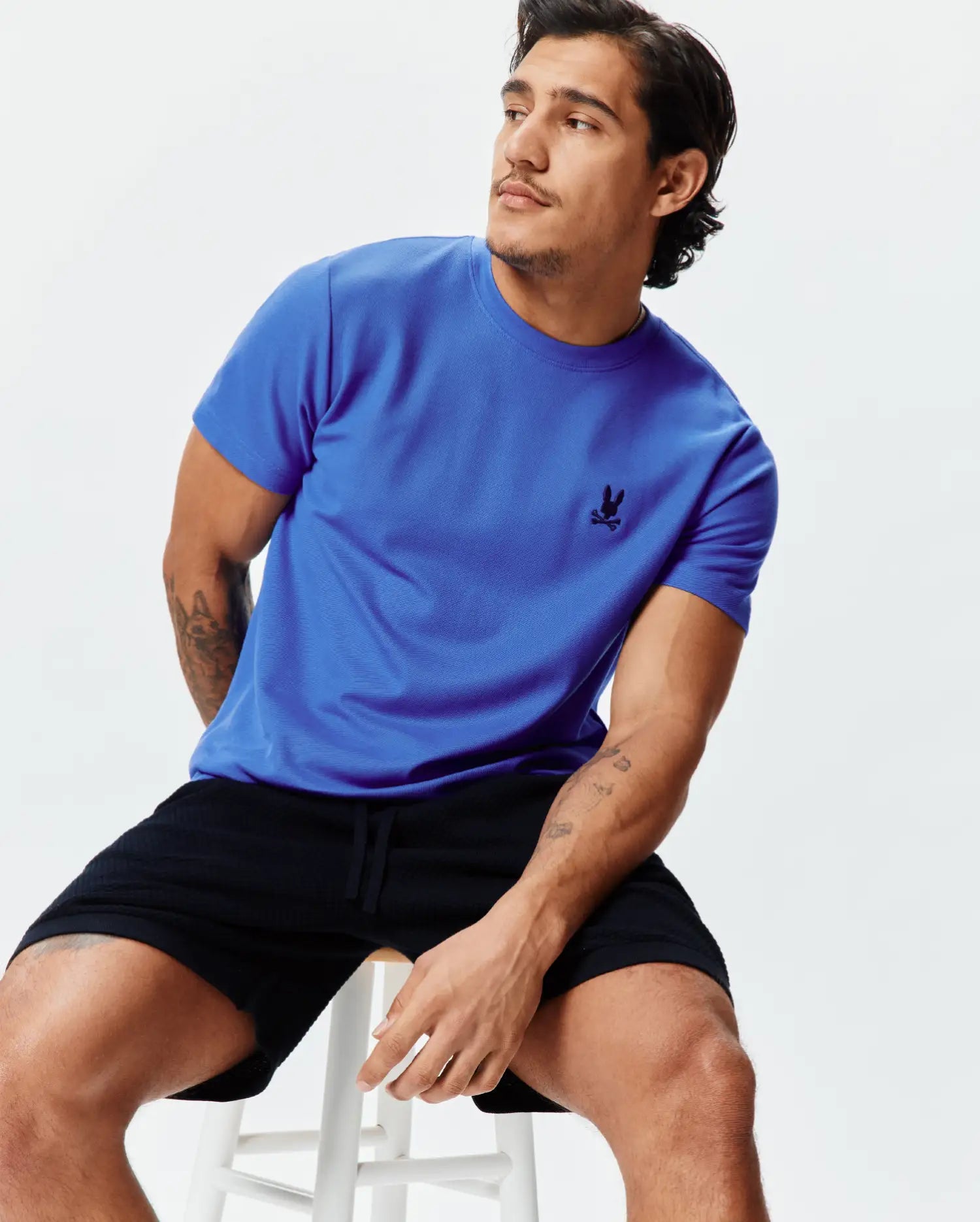 Royal blue Mens Taylor Pique Tee with a classic fit, featuring a small black embroidered Psycho Bunny skull logo on the left chest.