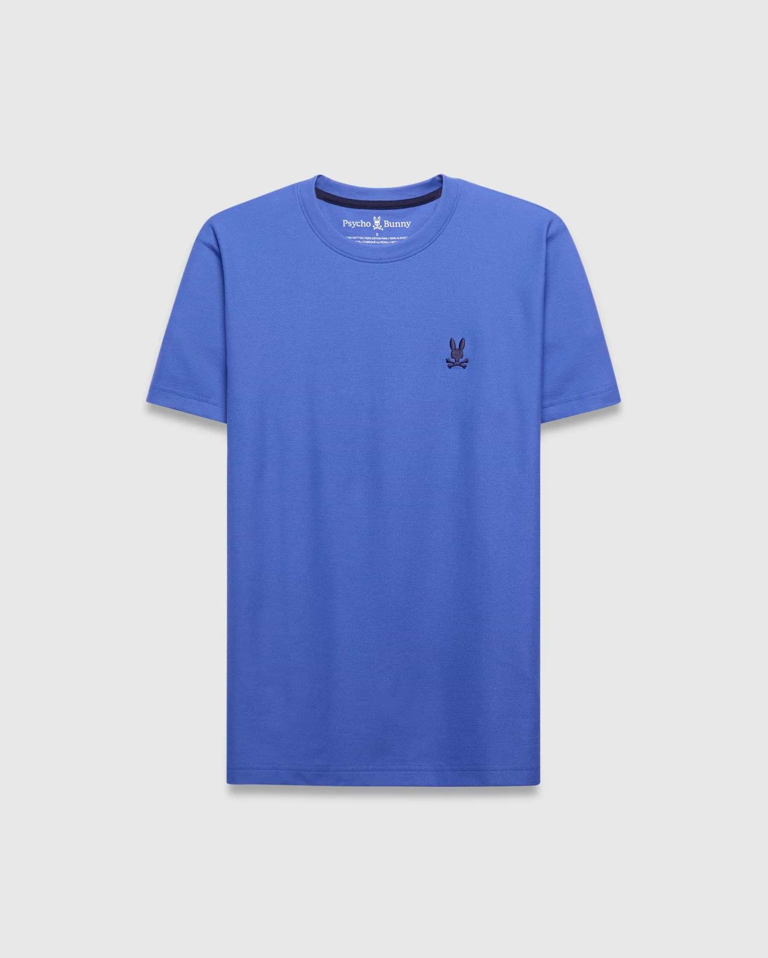 Mens Taylor Pique Tee in vibrant cobalt blue, classic fit, with a small, dark navy embroidered Psycho Bunny skull logo on the left chest.