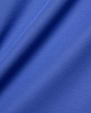 Psycho Bunny Mens Taylor Pique Tee fabric close-up, featuring a rich royal blue hue and the signature textured pique knit, ideal for refined streetwear.