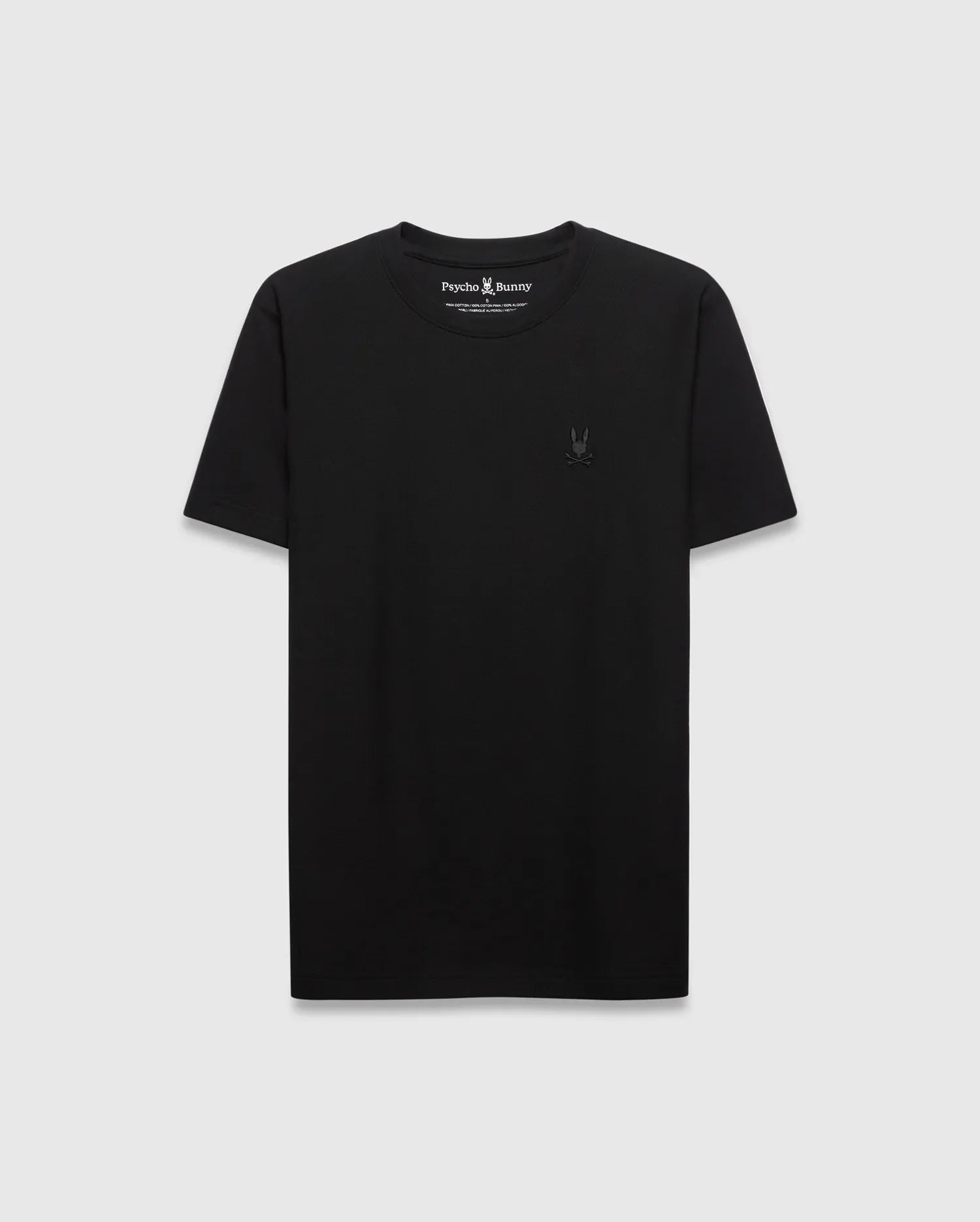 Mens Taylor Pique Tee, a classic fit black t-shirt crafted from pique fabric, featuring a small, tonal embroidered Psycho Bunny skull logo on the left chest.