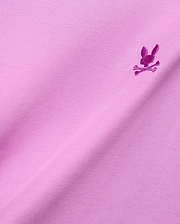 MENS TAYLOR PIQUE TEE in vibrant pink pique knit, featuring a small, intricately embroidered magenta Psycho Bunny skull logo on the chest, embodying refined streetwear style.