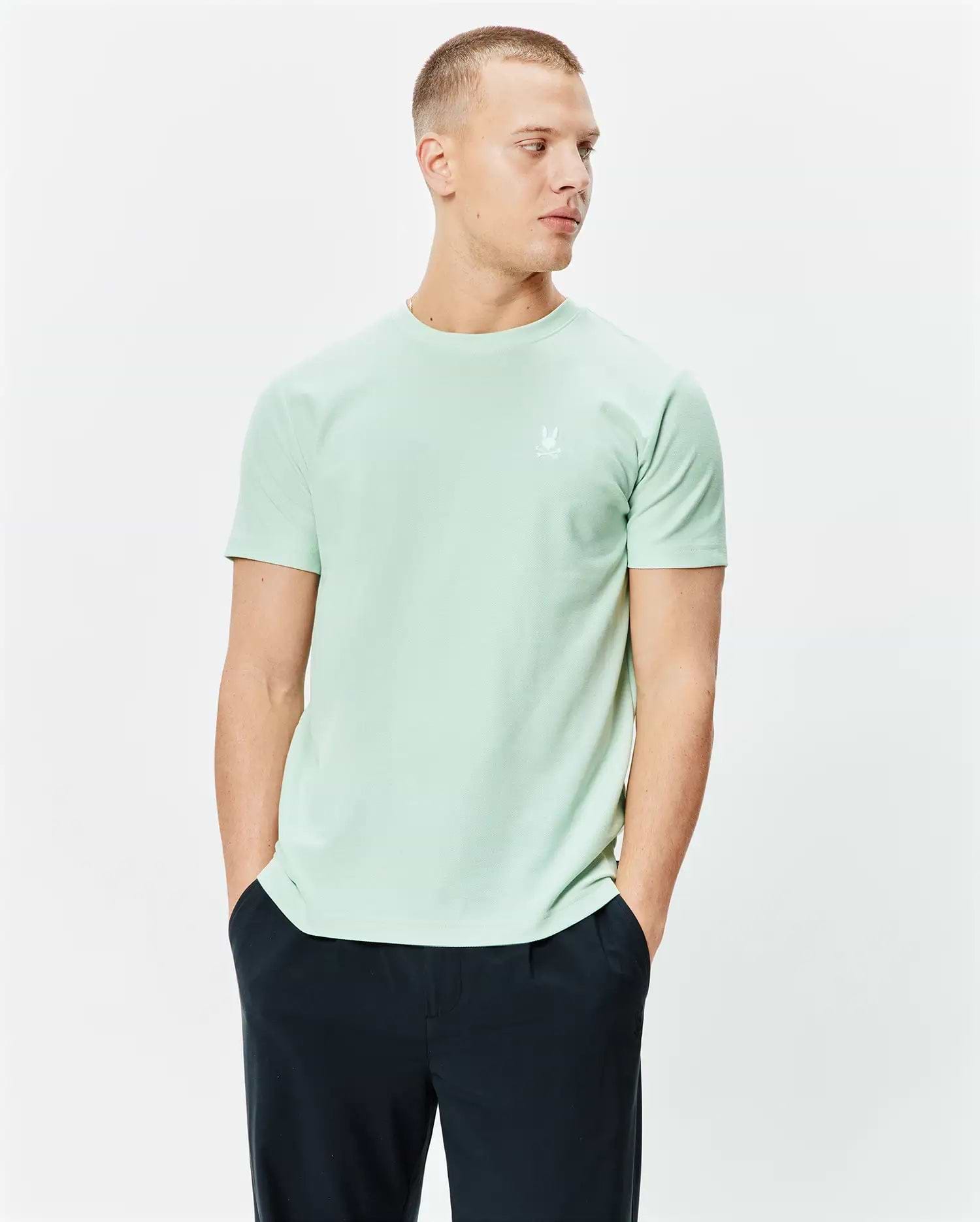 Mens Taylor Pique Tee, a classic fit light green pique t-shirt featuring a small embroidered white Psycho Bunny skull logo on the left chest.