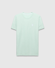 Mens Taylor Pique Tee, a classic fit light mint green pique knit t-shirt with a small white embroidered Psycho Bunny skull logo on the left chest and white neck trim.