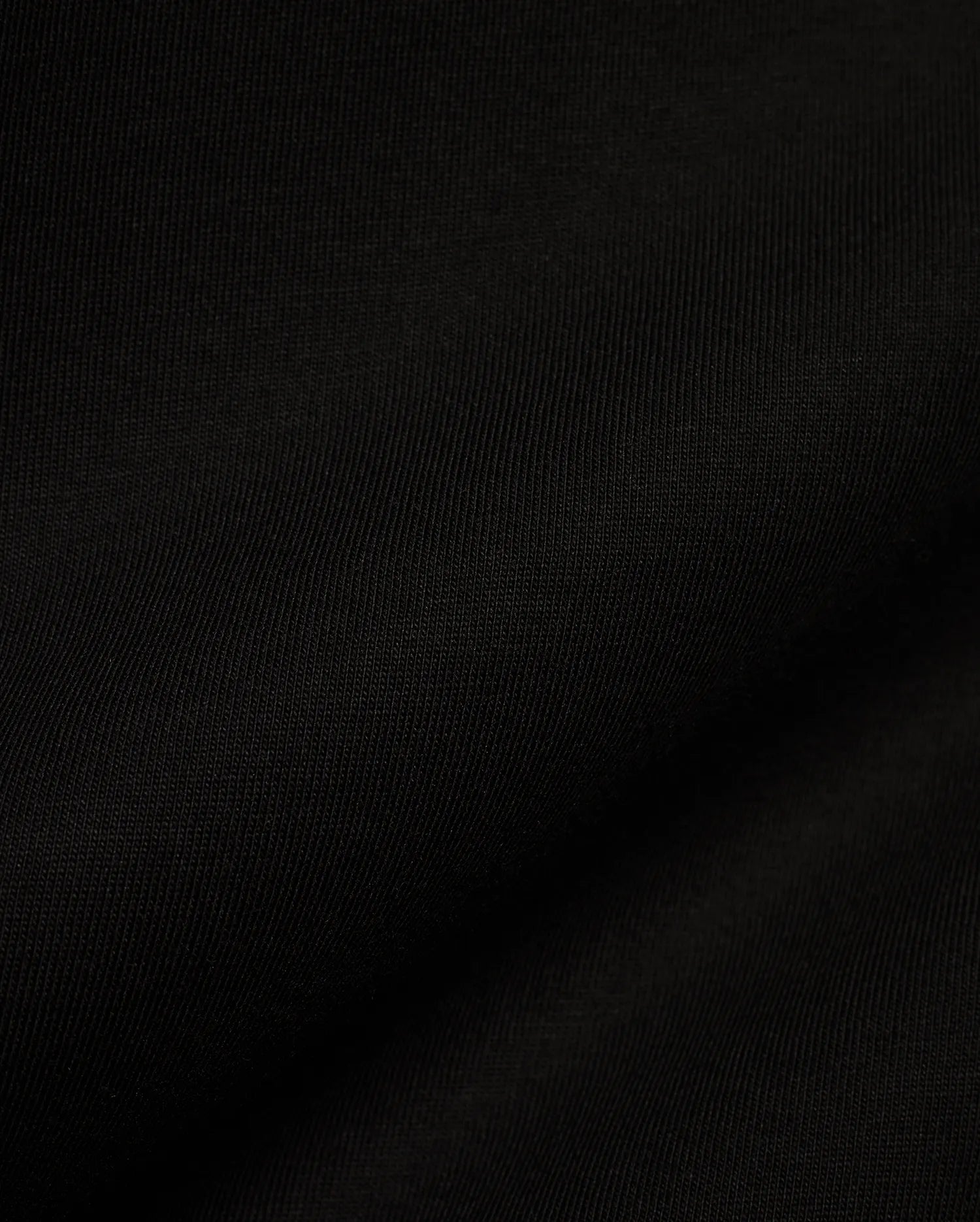 Men's Alfie Back Graphic Tee in rich black, crafted from a luxurious, ultra-soft, finely ribbed jersey knit fabric, ensuring a comfortable classic fit, embodying refined streetwear style. (6)