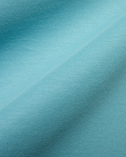 Men's Alfie Back Graphic Tee featuring a rich, vibrant turquoise soft jersey knit fabric with a finely woven, subtle diagonal texture, characteristic of premium Psycho Bunny apparel. (6)