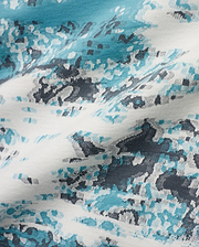Men's Alfie All-Over Jacquard Tee, a textured knit featuring an abstract pattern woven in white, vibrant teal, light blue, and charcoal grey. (6)