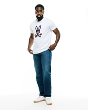 Men's Samson Graphic Tee, a classic fit white jersey t-shirt featuring a large navy and pink Psycho Bunny skull and crossbones graphic on the chest. (5)
