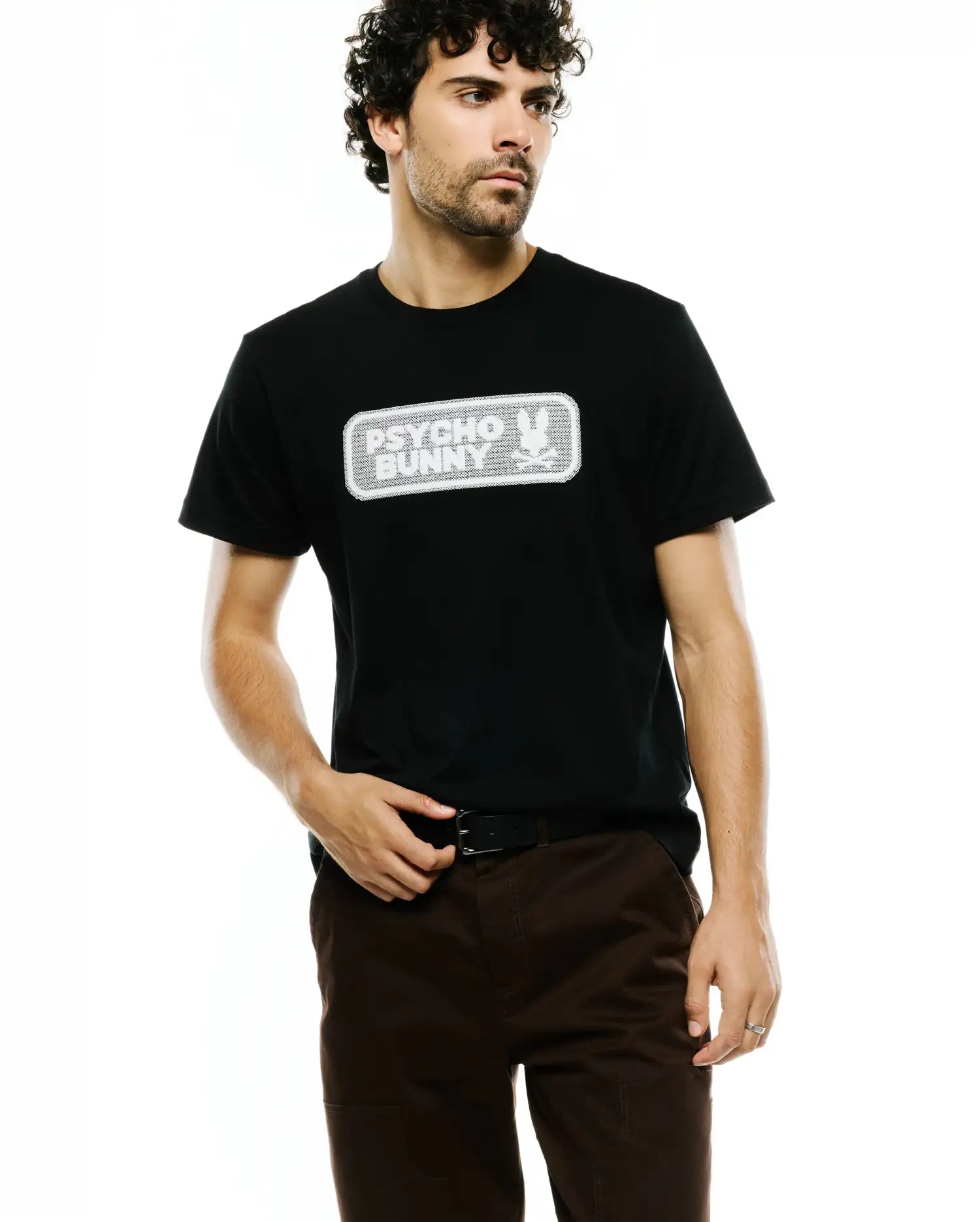 Men's Samson Wordmark Graphic Tee, a classic fit black jersey t-shirt featuring a large, textured white rectangular chest graphic with PSYCHO BUNNY text and the iconic bunny skull logo. (2)