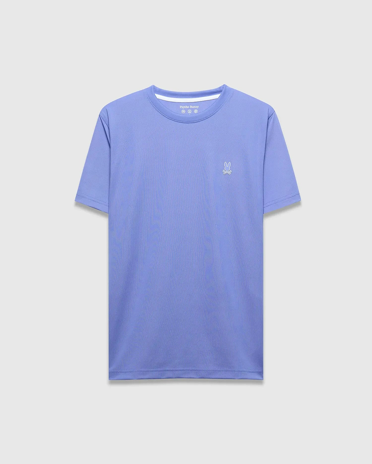 Mens Dash Bunny Sport Tee in periwinkle blue, featuring a classic fit, subtle textured performance fabric, and a small white embroidered Psycho Bunny skull logo on the left chest.