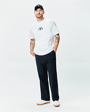 White Mens Stevie Relaxed Fit Tee in smooth jersey, featuring a small embroidered black Psycho Bunny arched text and iconic bunny skull logo on the center chest, offering a relaxed fit.