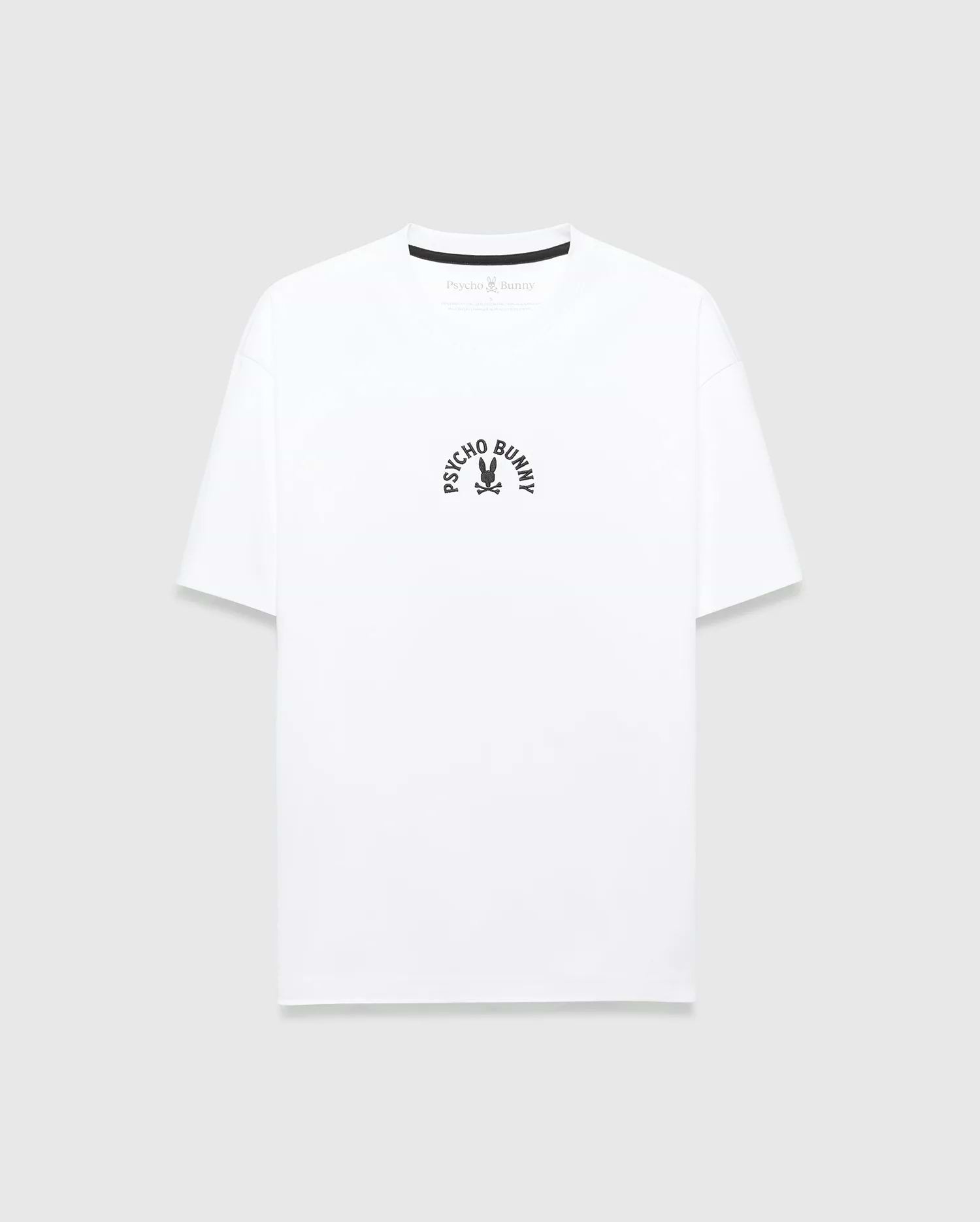 White Mens Stevie Relaxed Fit Tee, crafted from soft jersey fabric, showcasing a small, central chest black arched Psycho Bunny text and iconic skull logo.