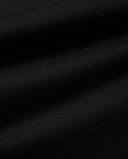 Men's Samson Oversized Bunny Tee, a black premium jersey knit fabric with a subtle diagonal texture, embodying Psycho Bunny's refined streetwear aesthetic. (6)