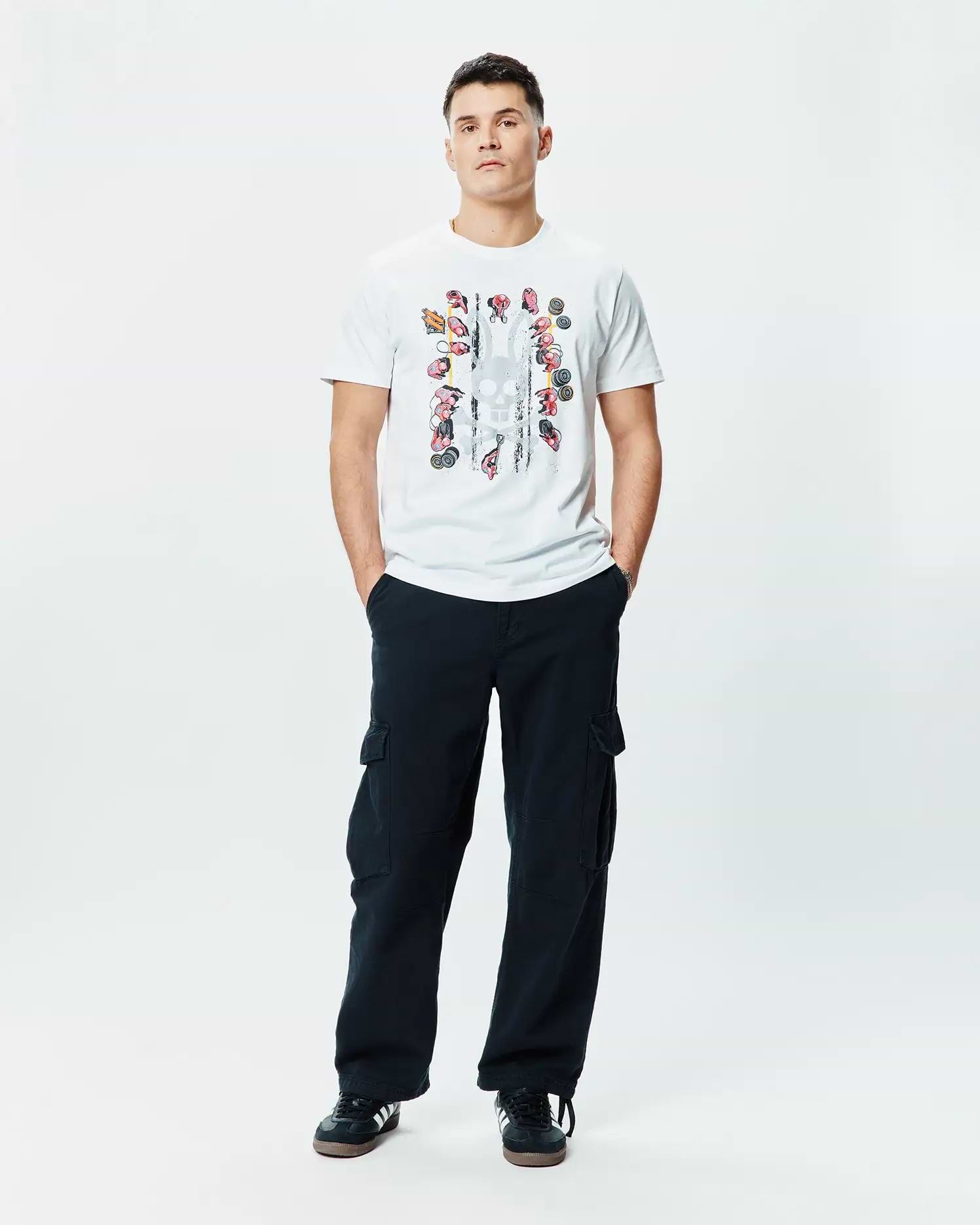 Mens Race Bunny Graphic Tee, a white classic fit jersey t-shirt featuring a large central distressed grey stripe graphic with colorful Psycho Bunny skull motifs.