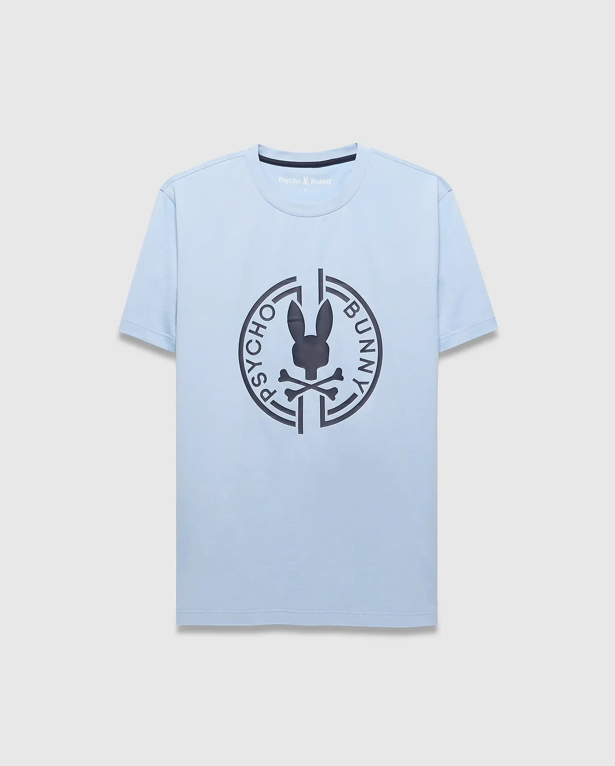 Mens Santa Fe Bunny Graphic Tee. Light blue jersey t-shirt with a classic fit, featuring a large dark grey circular chest graphic of the iconic Psycho Bunny skull logo and brand name. (1)