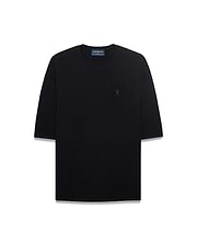 Mens Makai Textured Knit T-Shirt in black, featuring a relaxed fit, textured knit fabric, and a tonal embroidered Psycho Bunny skull logo on the left chest.