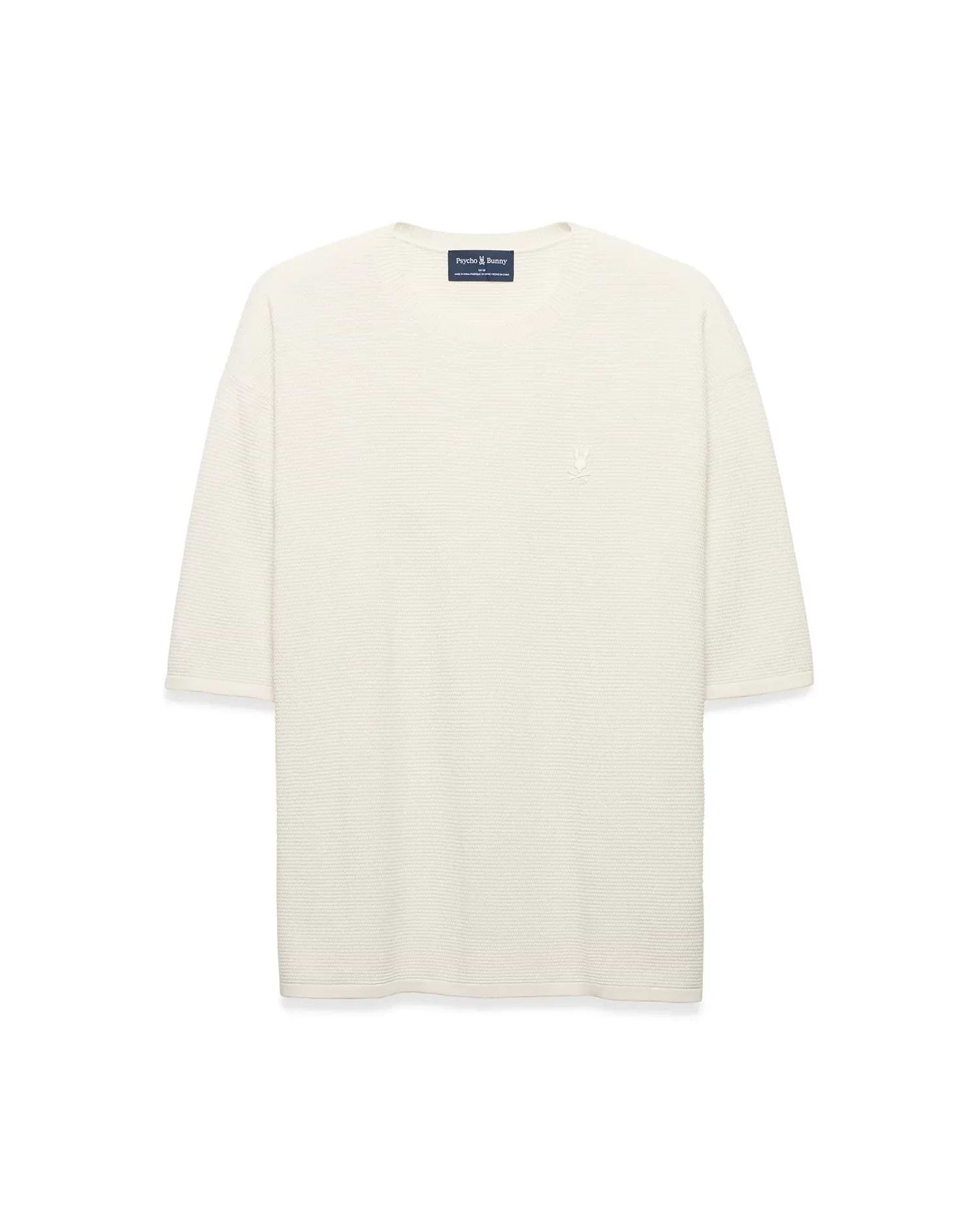 Mens Makai Textured Knit T-Shirt in cream, featuring a relaxed fit, subtle horizontal textured knit, and a small tonal embroidered Psycho Bunny skull logo on the left chest.