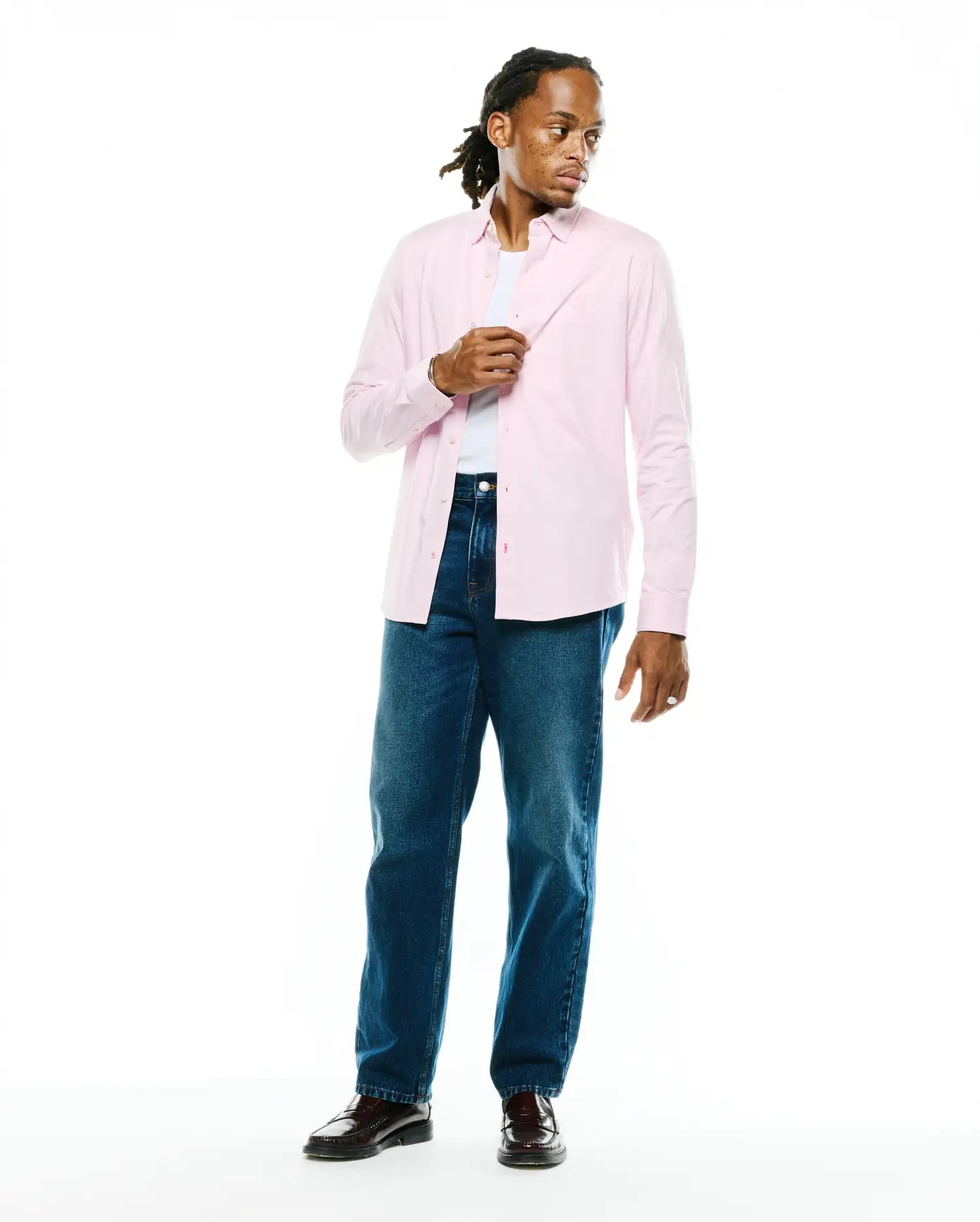Men's Jim Jersey Longsleeve Shirt, a classic fit pink shirt in smooth jersey fabric, featuring a button-down collar, full button placket, and a small embroidered Psycho Bunny skull logo on the left chest. (3)
