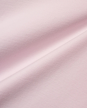Men's Jim Jersey Longsleeve Shirt, a close-up of the premium light pink jersey knit fabric, showcasing its soft, smooth texture with subtle diagonal ribbing and elegant draping folds. (5)