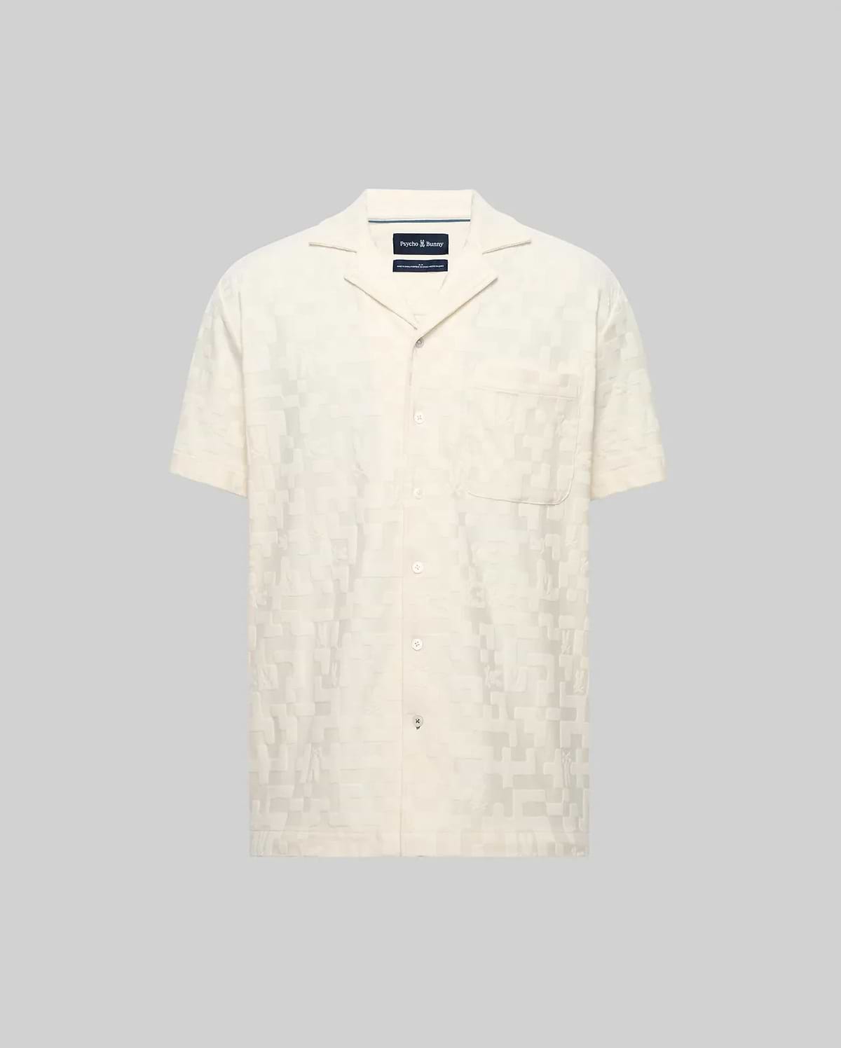 Mens Josh Jacquard Shirt, a cream short-sleeve button-up with a subtle all-over geometric jacquard pattern, relaxed fit, spread collar, and a single chest patch pocket.