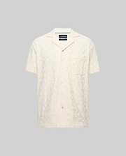 Mens Josh Jacquard Shirt, a cream short-sleeve button-up with a subtle all-over geometric jacquard pattern, relaxed fit, spread collar, and a single chest patch pocket.