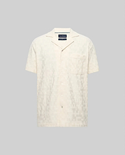 Mens Josh Jacquard Shirt, a cream short-sleeve button-up with a subtle all-over geometric jacquard pattern, relaxed fit, spread collar, and a single chest patch pocket.