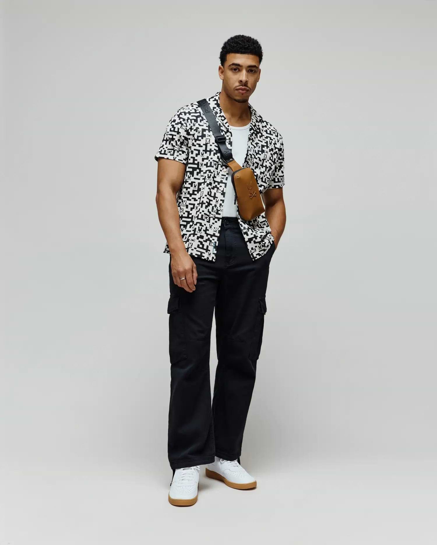 Mens Josh Jacquard Shirt, a white shirt with a black pixelated jacquard pattern featuring integrated Psycho Bunny skull logos, in a relaxed fit.