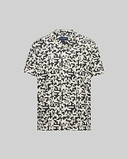 Mens Josh Jacquard Shirt, cream short-sleeve with black all-over geometric and small Psycho Bunny skull pattern, relaxed fit, soft jacquard fabric.