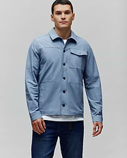 Mens Maverick Overshirt, slate blue, classic fit. Full button-front, black buttons, two chest flap pockets with small embroidered Psycho Bunny skull logo, two large patch pockets. (1)