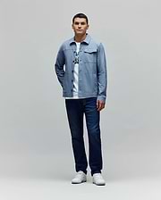 Mens Maverick Overshirt in light blue, featuring a classic fit, smooth fabric, button-front, two chest flap pockets, and a small white embroidered Psycho Bunny skull logo on the left chest. (4)