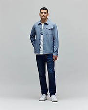 Mens Maverick Overshirt in light blue, featuring a classic fit, smooth fabric, button-front, two chest flap pockets, and a small white embroidered Psycho Bunny skull logo on the left chest. (4)