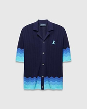 Mens Holden Oversized Knit Shirt, navy blue wavy knit with camp collar, button front, wavy blue gradient stripes sleeves and hem, embroidered light blue Psycho Bunny skull logo left chest.