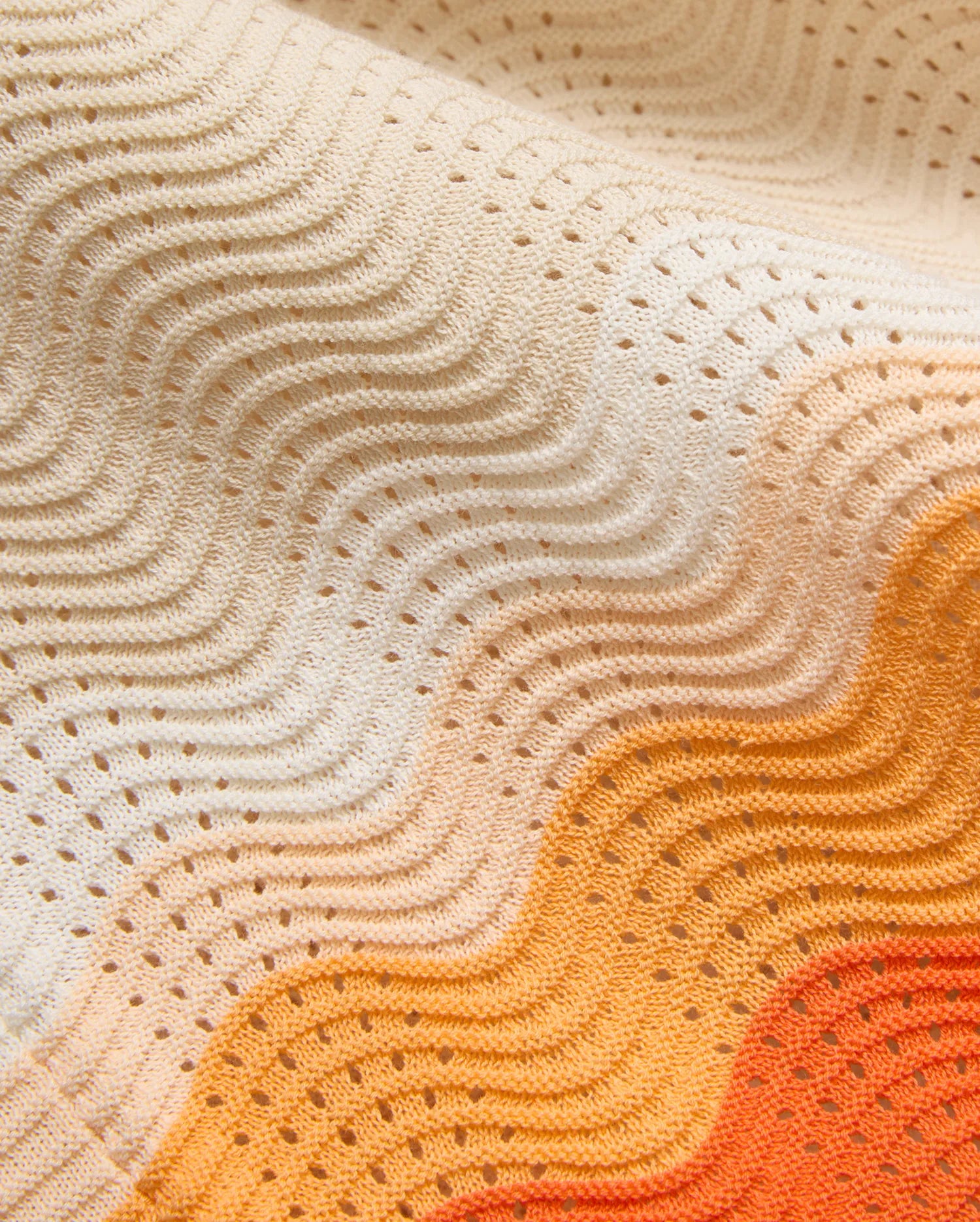 Mens Holden Relaxed Fit Knit Shirt with a vibrant cream to deep orange gradient, showcasing a distinctive wavy open-knit pattern and breathable perforated texture.
