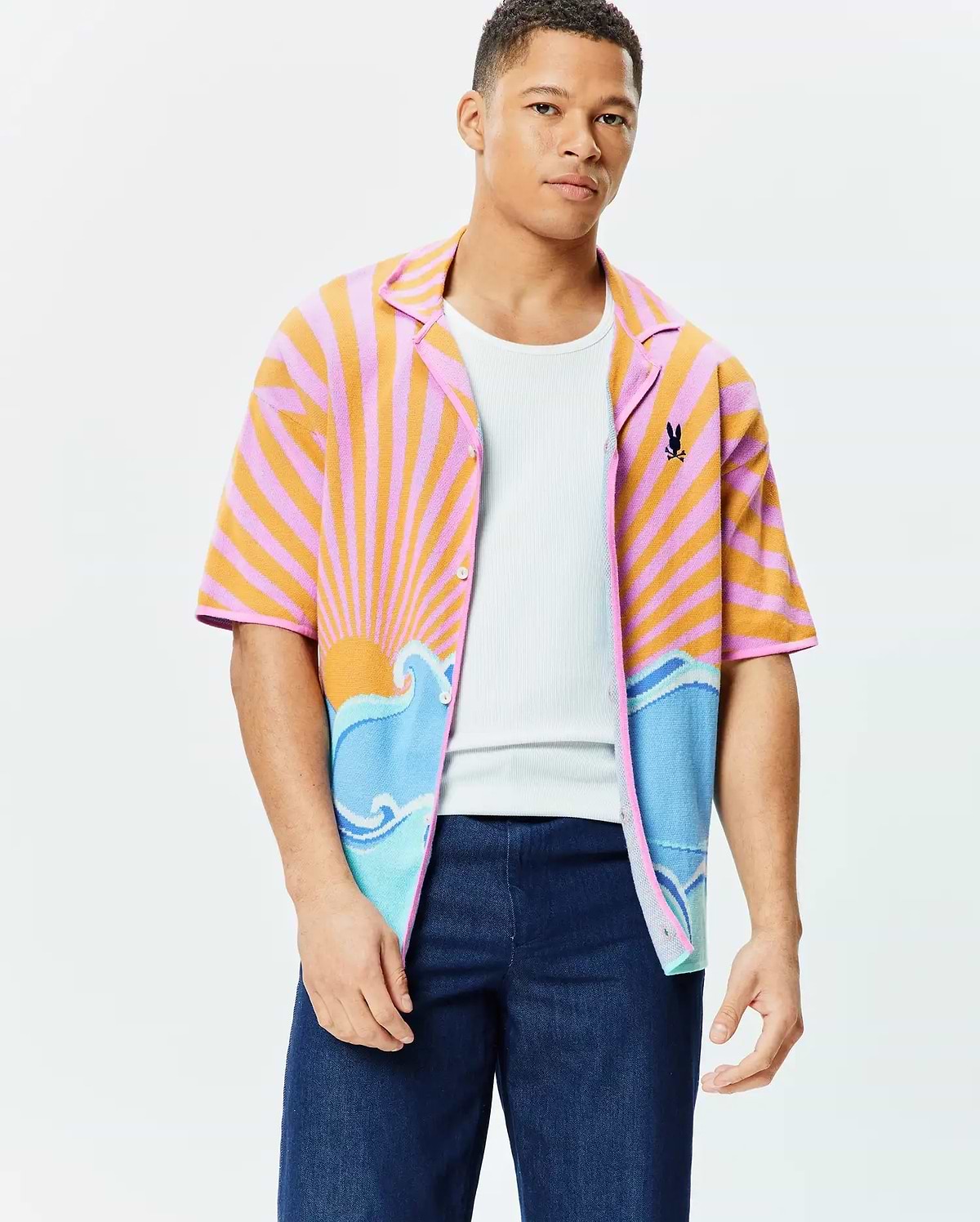 Mens Ray Relaxed Fit Jacquard Shirt with a vibrant pink and orange striped sunburst, blue and light blue wave pattern, and small embroidered Psycho Bunny skull logo on the left chest.
