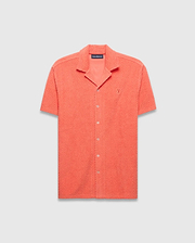 Mens Tristan Shirt, coral relaxed fit short-sleeve camp collar shirt with textured diamond jacquard pattern and small embroidered Psycho Bunny skull logo on left chest.