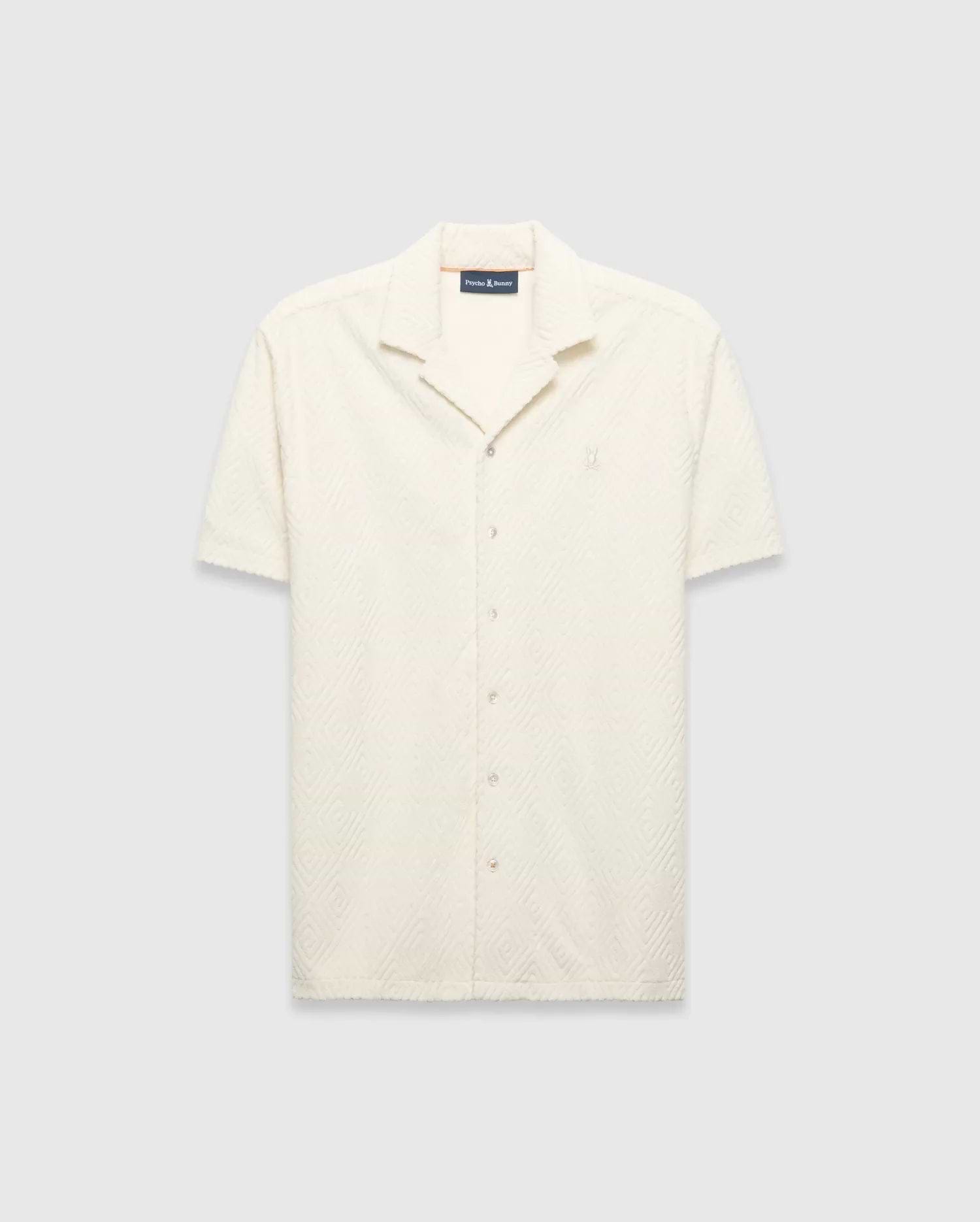 Mens Tristan Shirt, an ecru short-sleeve camp collar shirt in textured terry fabric with an all-over diamond pattern and a small embroidered Psycho Bunny logo on the left chest.