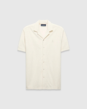 Mens Tristan Shirt, an ecru short-sleeve camp collar shirt in textured terry fabric with an all-over diamond pattern and a small embroidered Psycho Bunny logo on the left chest.