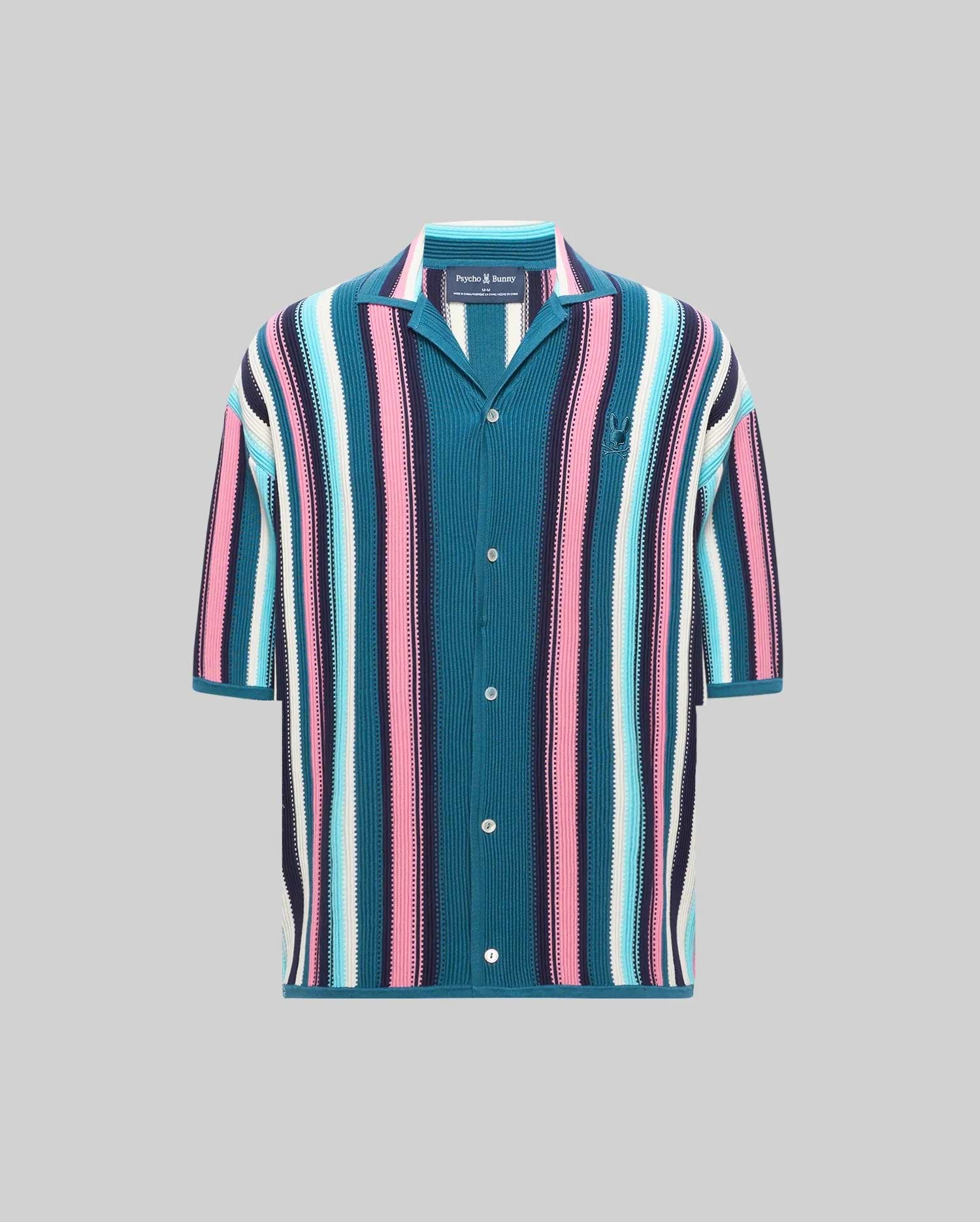 Mens Cliff Shirt, a relaxed fit knit shirt with bold vertical stripes in teal, pink, light blue, white, and navy, featuring a spread collar and an embroidered Psycho Bunny skull logo on the left chest.